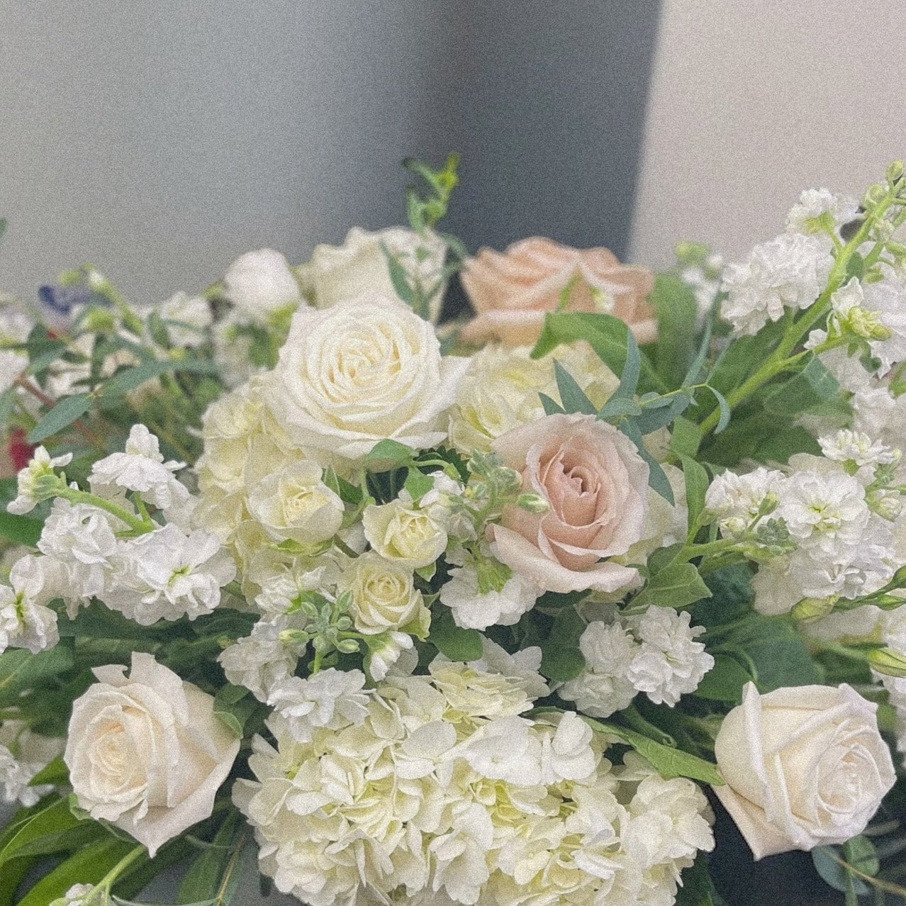 Victorian Elegance floral arrangement with white roses and blush tones, ideal for sympathy and funeral, best in Toronto, same day delivery.