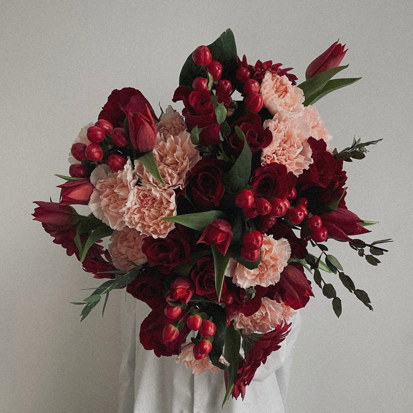 "Passionate red rose bouquet wrapped in luxury paper, the perfect Valentine’s Day or romantic gift."
