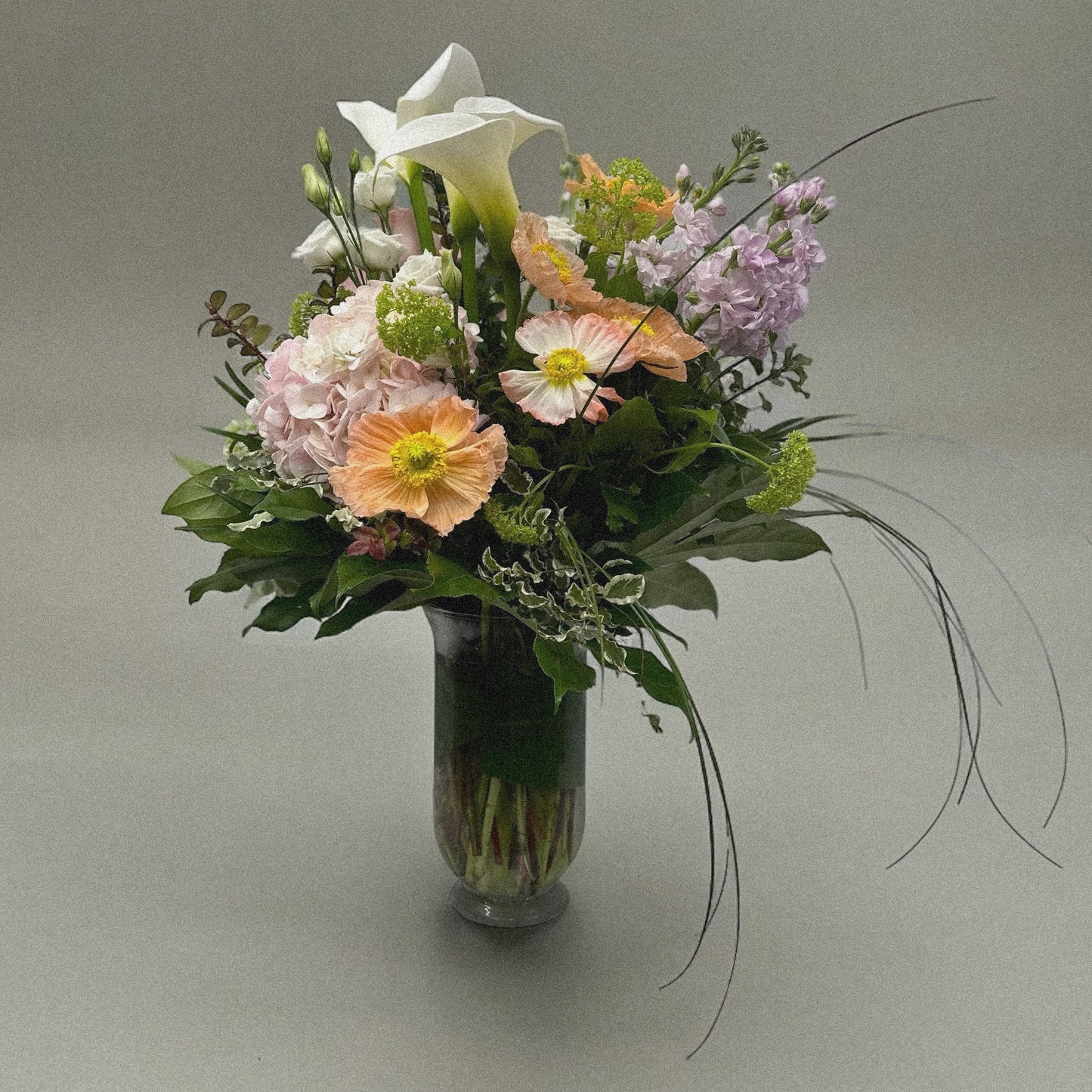 Tranquil Elegance floral vase with peace lily, vibrant blooms, luxury arrangement, perfect for all occasions, best florist in Toronto.
