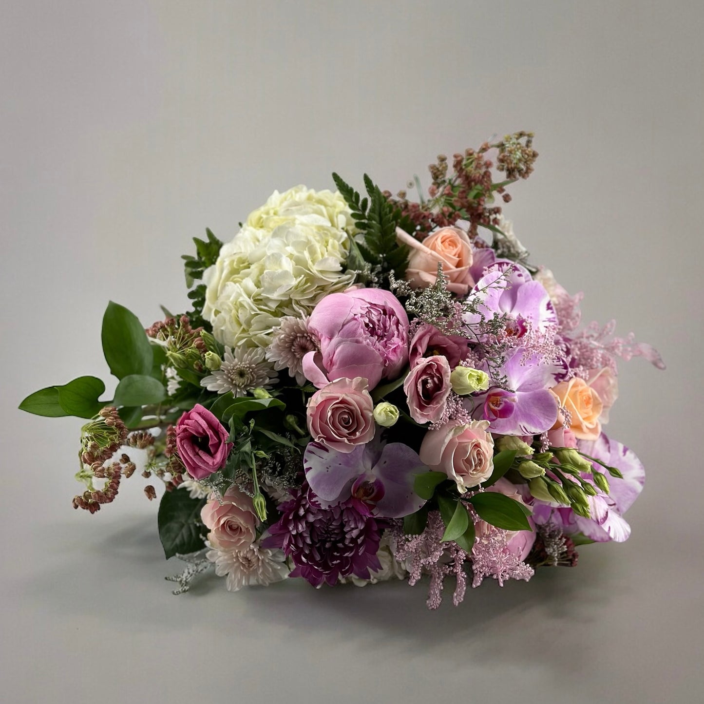 Pastel Garden Bouquet with pink roses and peonies by best florist in Toronto, luxury bouquet, same day delivery available.