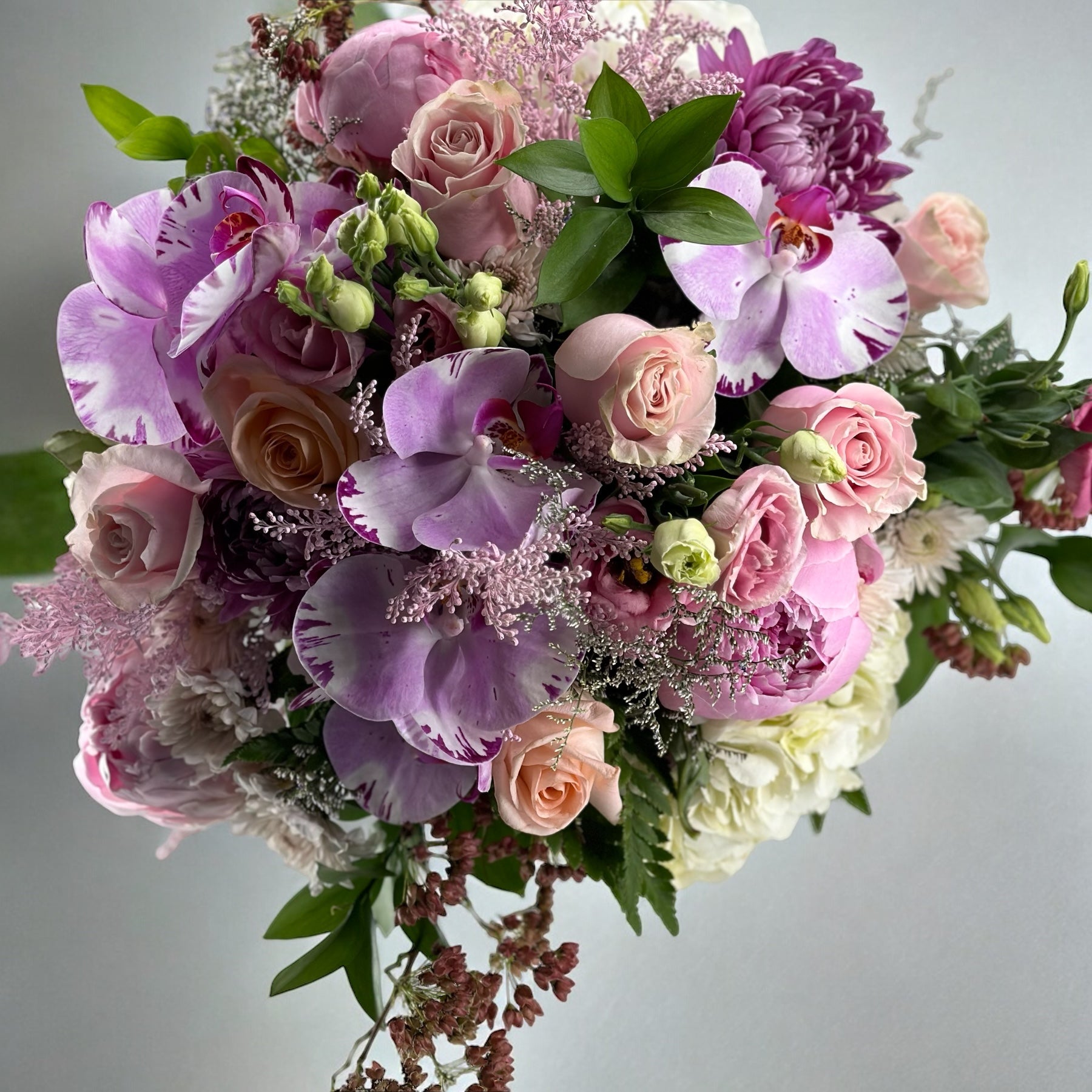 Luxurious pastel garden bouquet featuring soft pink and peach roses, perfect for romantic occasions. Best florist in Toronto offers same-day delivery.