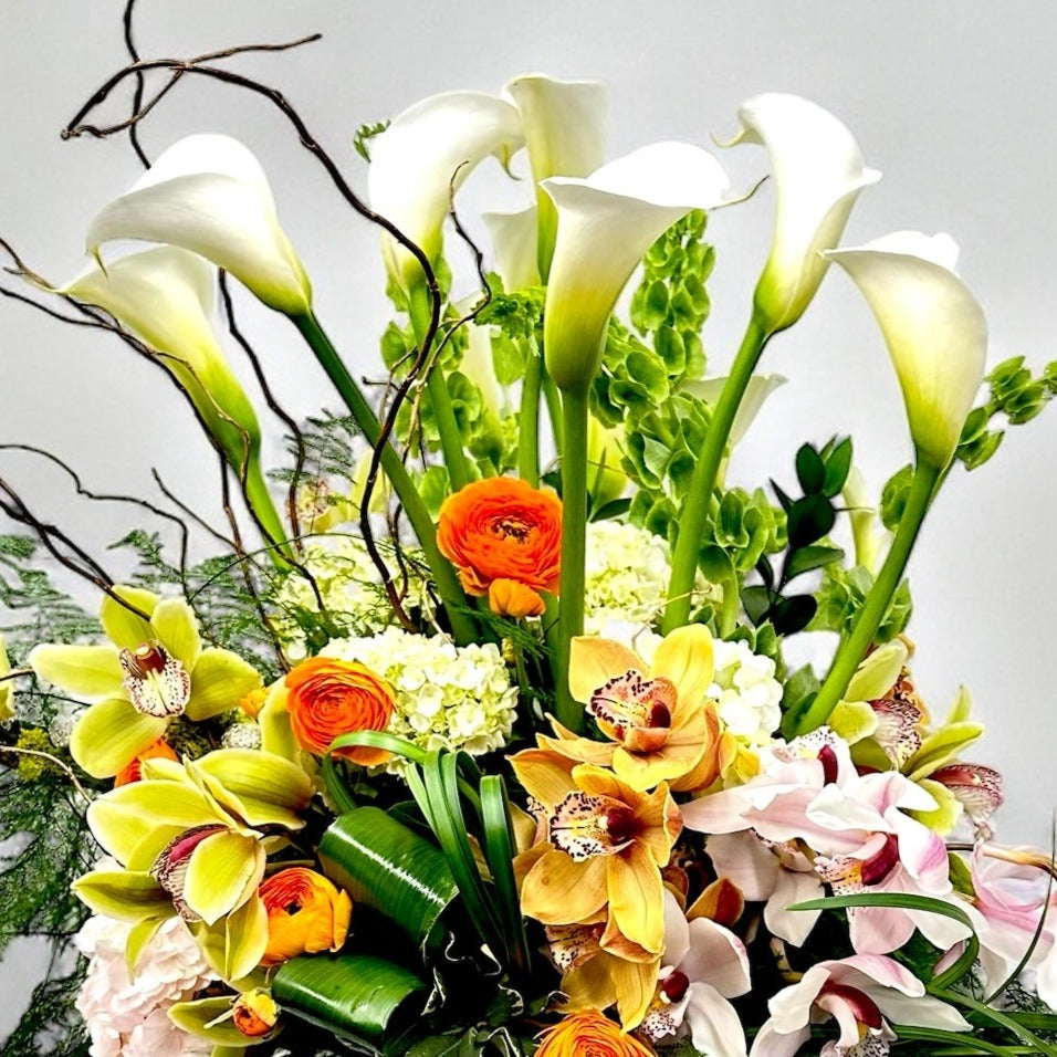 Timeless Bloom floral arrangement with white calla lilies, available from the best Toronto florist, offers luxury freshness and same day delivery.