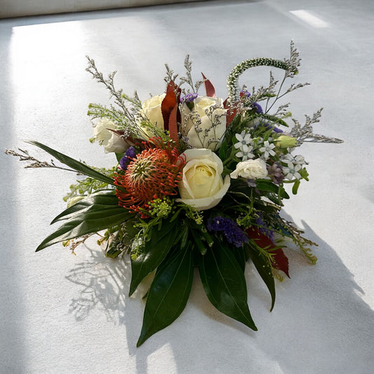 Autumn Bliss floral arrangement with elegant white roses, lush greenery, available for same day delivery by best Toronto and GTA florist.
