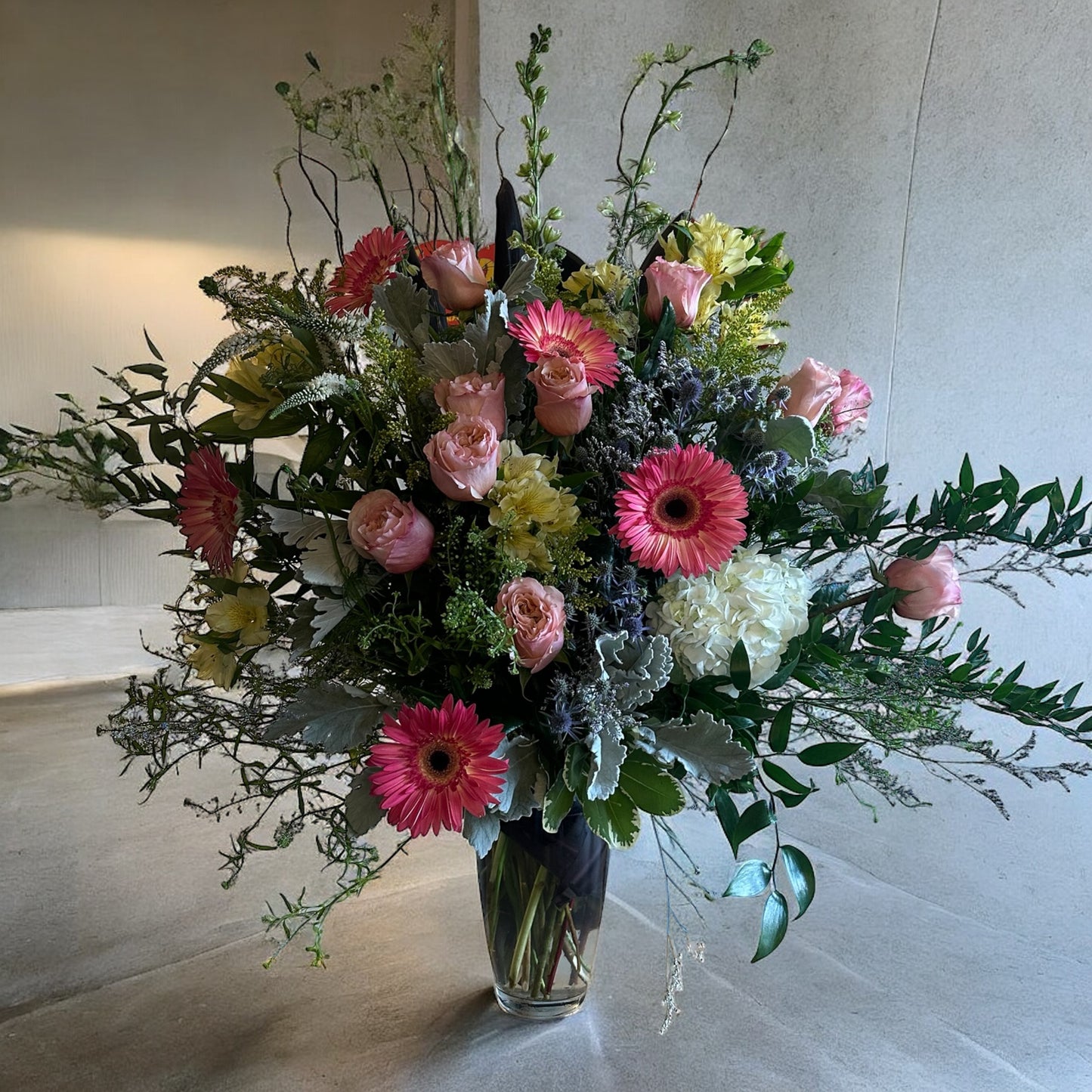 Blossom Radiance Vase with pink roses and vibrant blooms, luxury flowers in Toronto for same-day delivery.