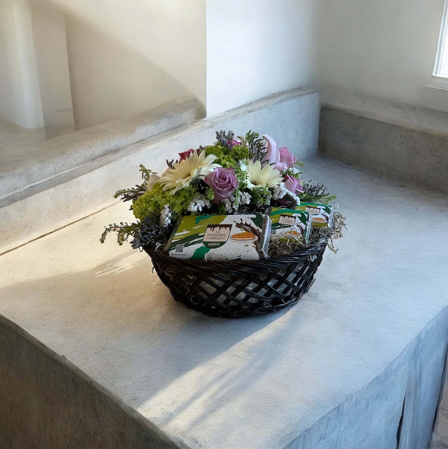 Romantic flower box with preserved roses, chocolates, and a love note, the perfect heartfelt gift."