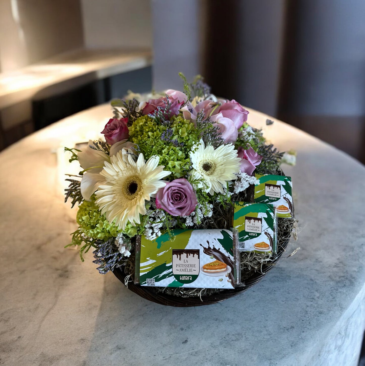 Romantic flower box with preserved roses, chocolates, and a love note, the perfect heartfelt gift."