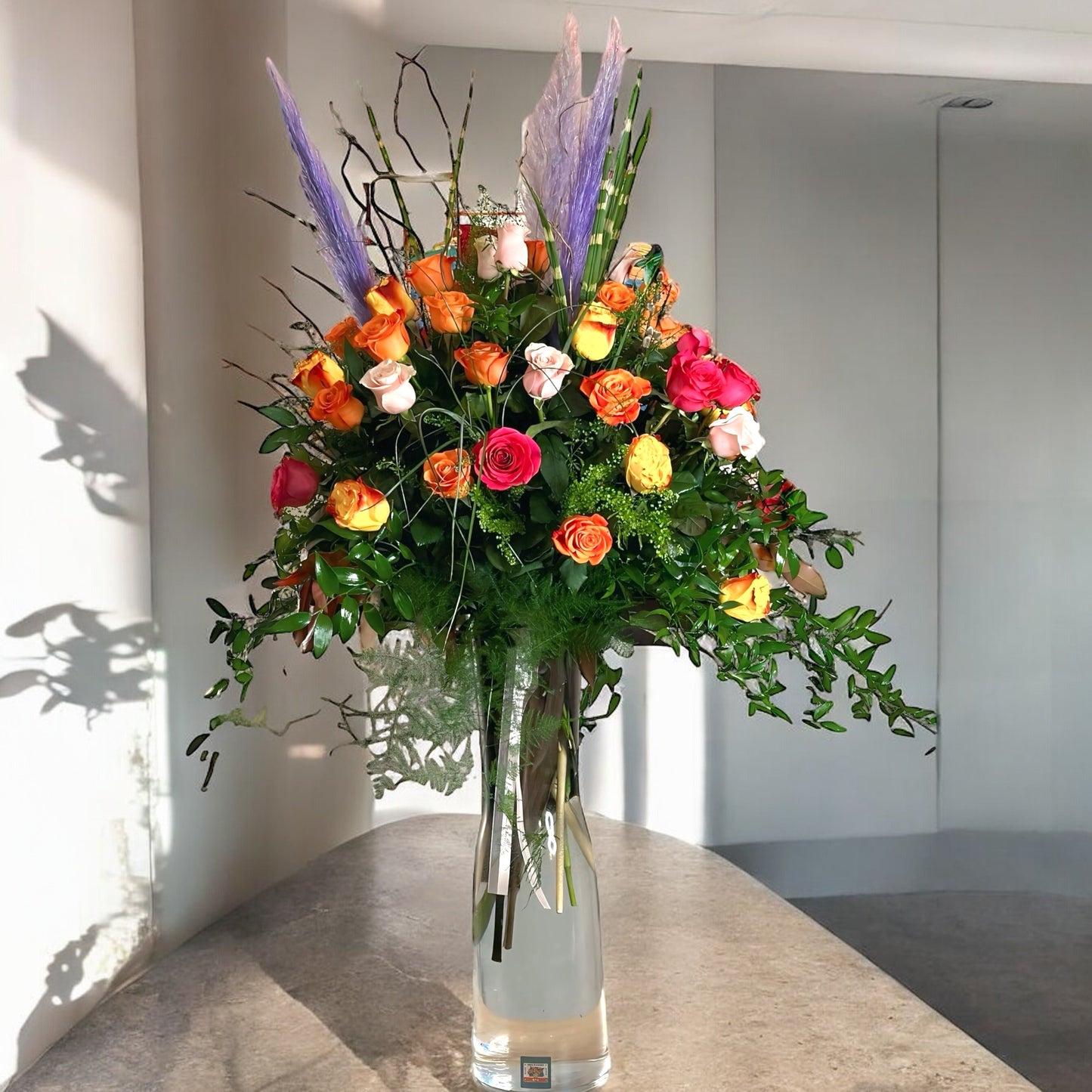 Handcrafted mix rose bouquet and eucalyptus, symbolizing eternal love and admiration.