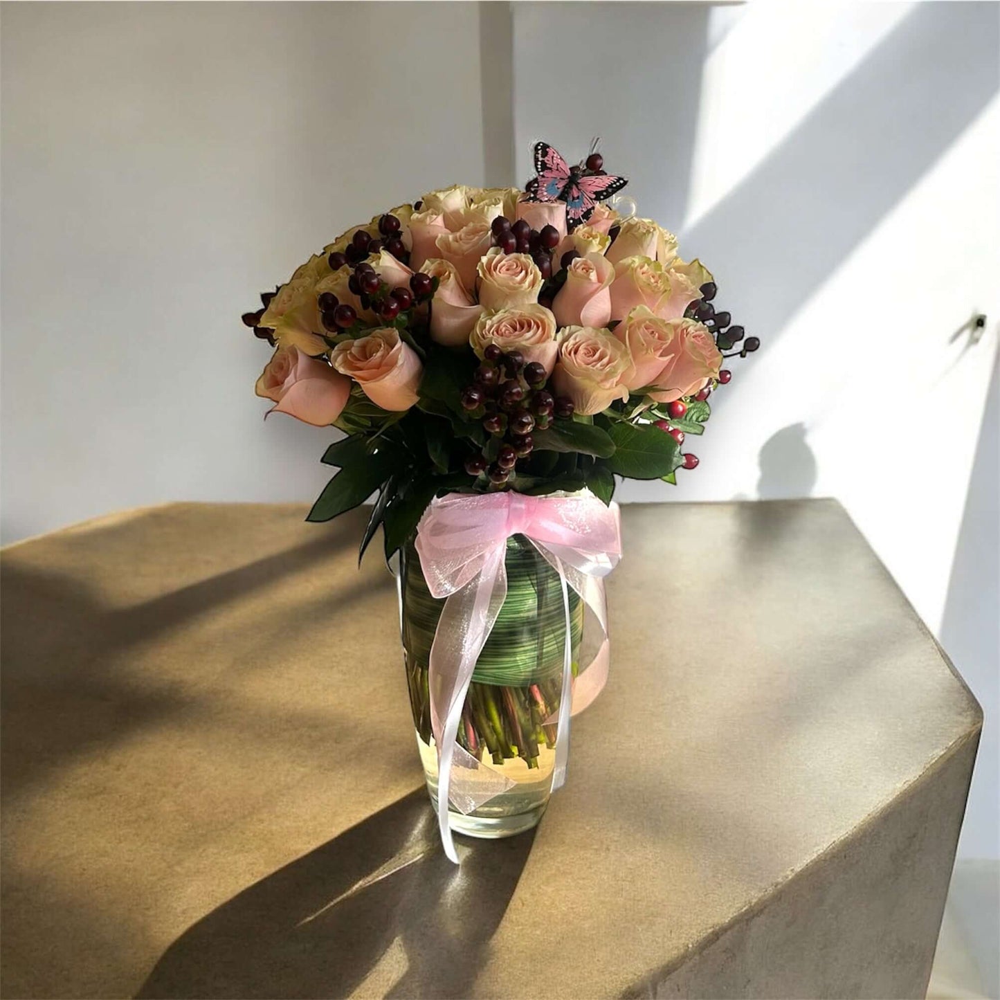 Elegant floral box with premium red roses, chocolates, and a personalized note for a special occasion