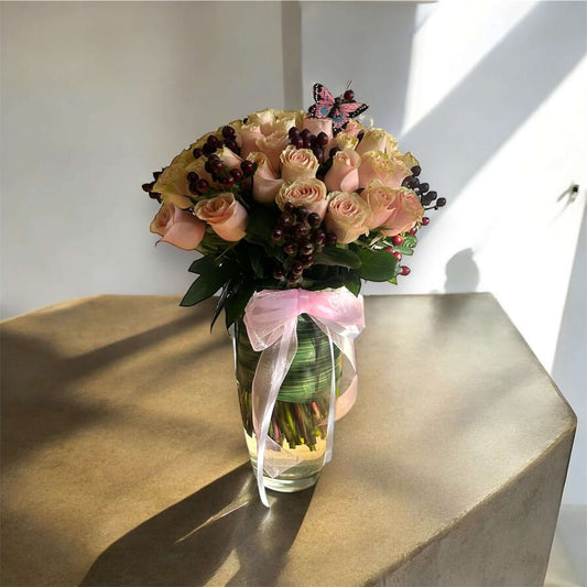 Elegant floral box with premium red roses, chocolates, and a personalized note for a special occasion
