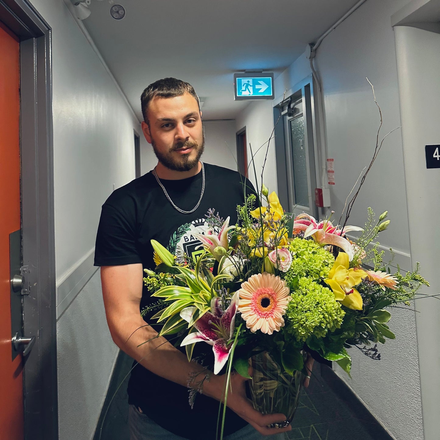 Autumn-inspired bouquet with warm-toned chrysanthemums, sunflowers, and seasonal foliage