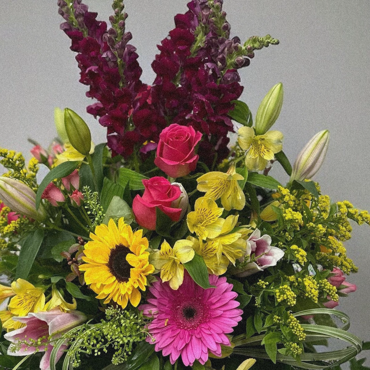 Vibrant Elegance Floral Arrangement with colorful blooms for all occasions from the best flowershop, offering same day delivery in Toronto GTA.