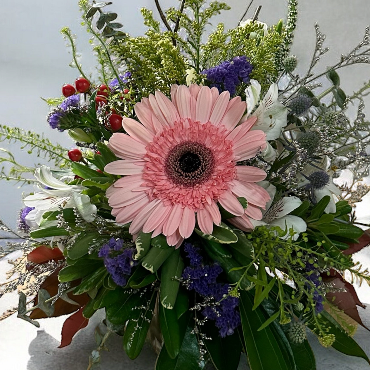Aurora Delight bouquet with pink gerbera daisy, greenery, and colorful blooms; luxury floral arrangement by best Toronto and GTA florist.