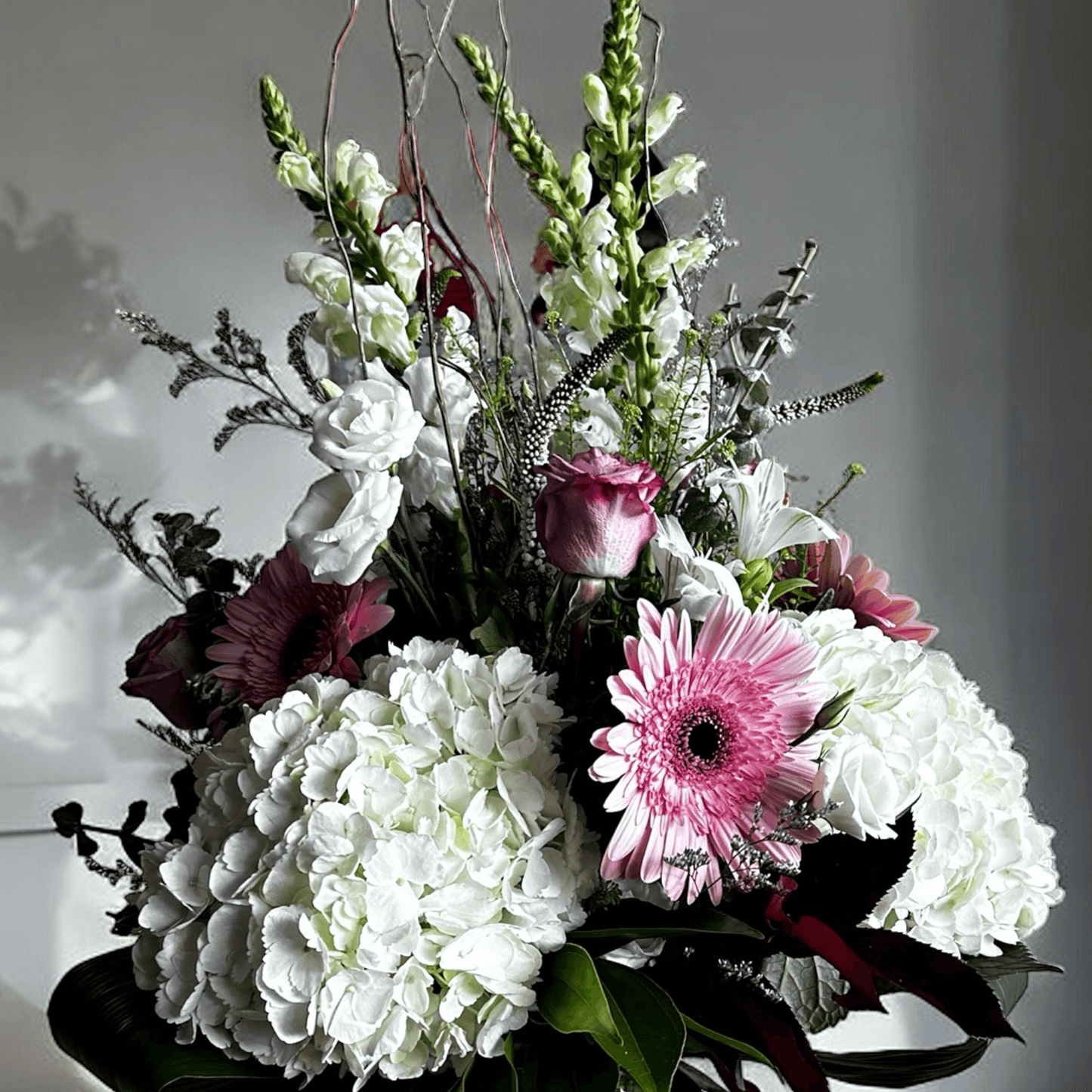 Antoinette’s Classic luxury floral arrangement with white hydrangeas, pink flowers, by best Toronto and GTA florist, same day delivery.